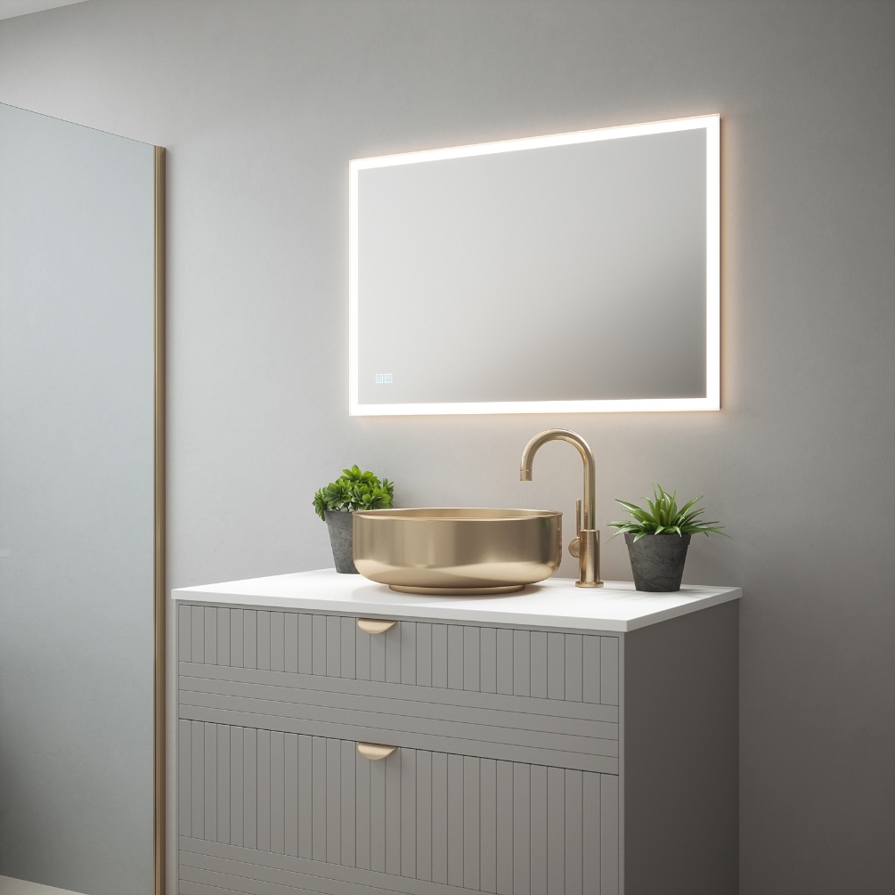 Product Lifestyle image of the Soho 900mm Colour Changing LED Mirror mounted in landscape